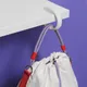 Набор Welcome Pack Bag-Changer в сумке-шопере: планер, подставка для ноутбука, бутылка для воды, ручка, брелок, шнурок, визитница, карточки-статусы, крючок для сумок, красный / сиреневый - фото № 4